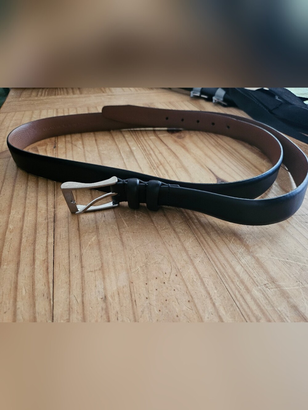 Men's black faux leather belt with a silver-tone Buckle